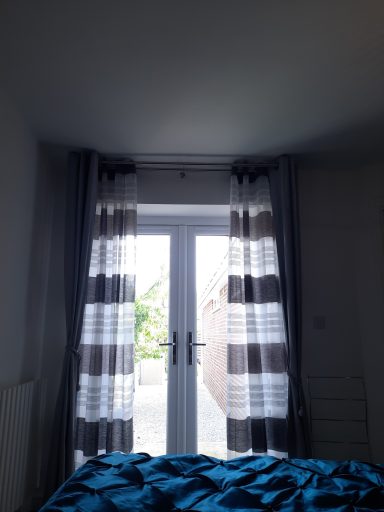 View from bed, french doors to garden